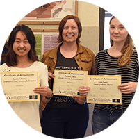 Students in the Michigan Geophysical Union hold award certificates